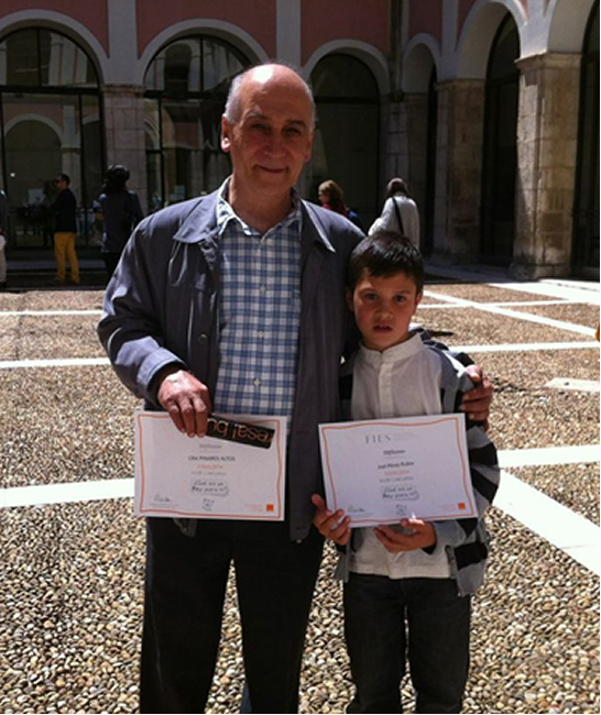 Joel Rubio con su tutor