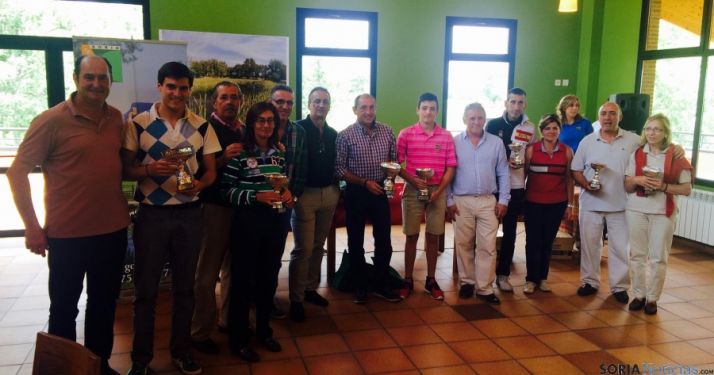 Los golfistas ganadores. 