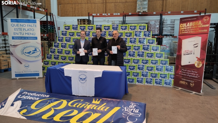 El Banco de Alimentos recibe una tonelada de leche solidaria gracias al libro de un soriano