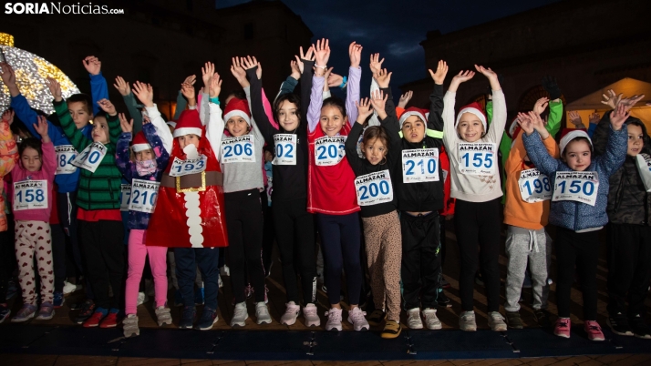 Fotos: Almazán celebra la Navidad con una carrera con cientos de participantes