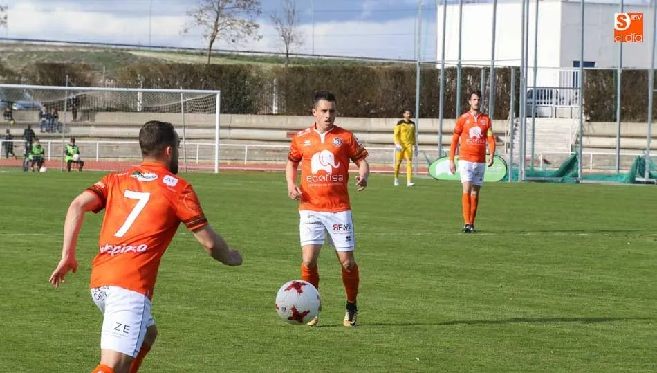 Cristo y Piojo, con Antonio León al fondo, en el partido del sábado de Unionistas.