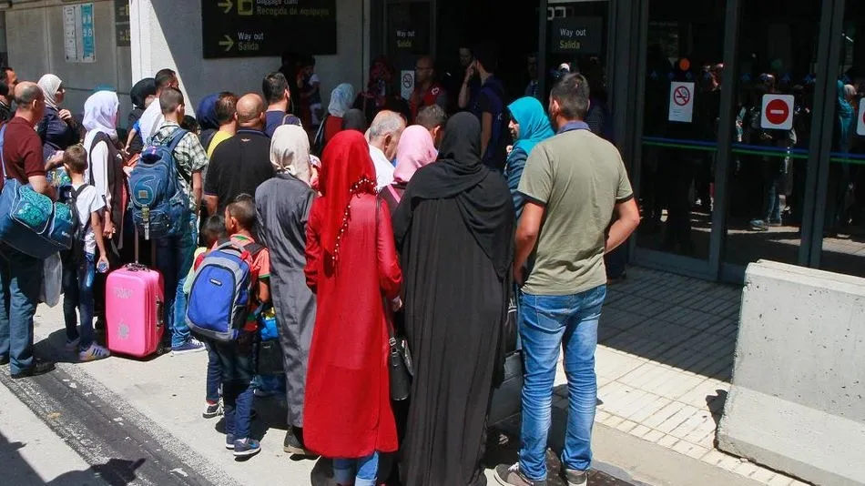Grupo de refugiados a su llegada a España. Foto: Ministerio del Interior