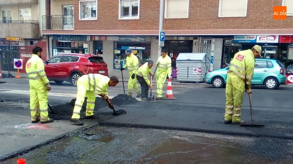 Trabajadores en la avenida de Portugal
