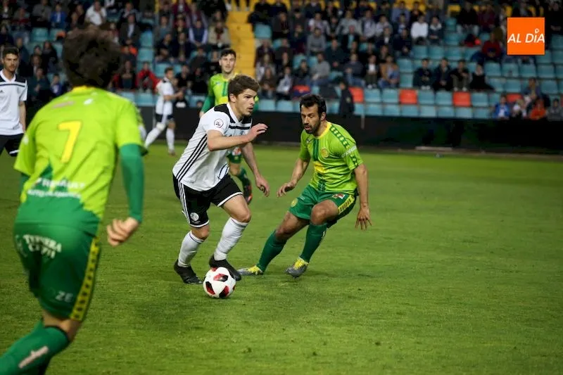 Amaro, ante la atenta mirada de Cristian Portilla el año pasado