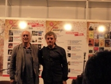 Juan Carlos Mestre y Amancio Prada, en la Feria del Libro