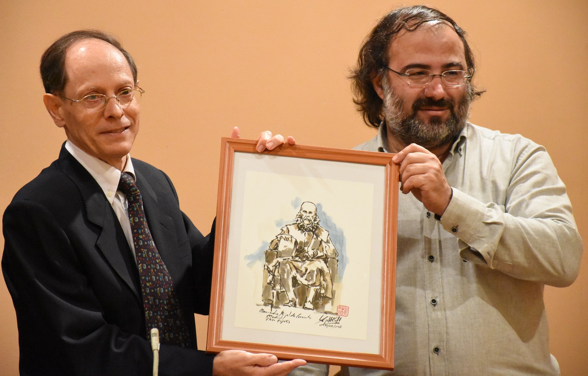 Martínez y Alencart, con una de las obra de Miguel Elías